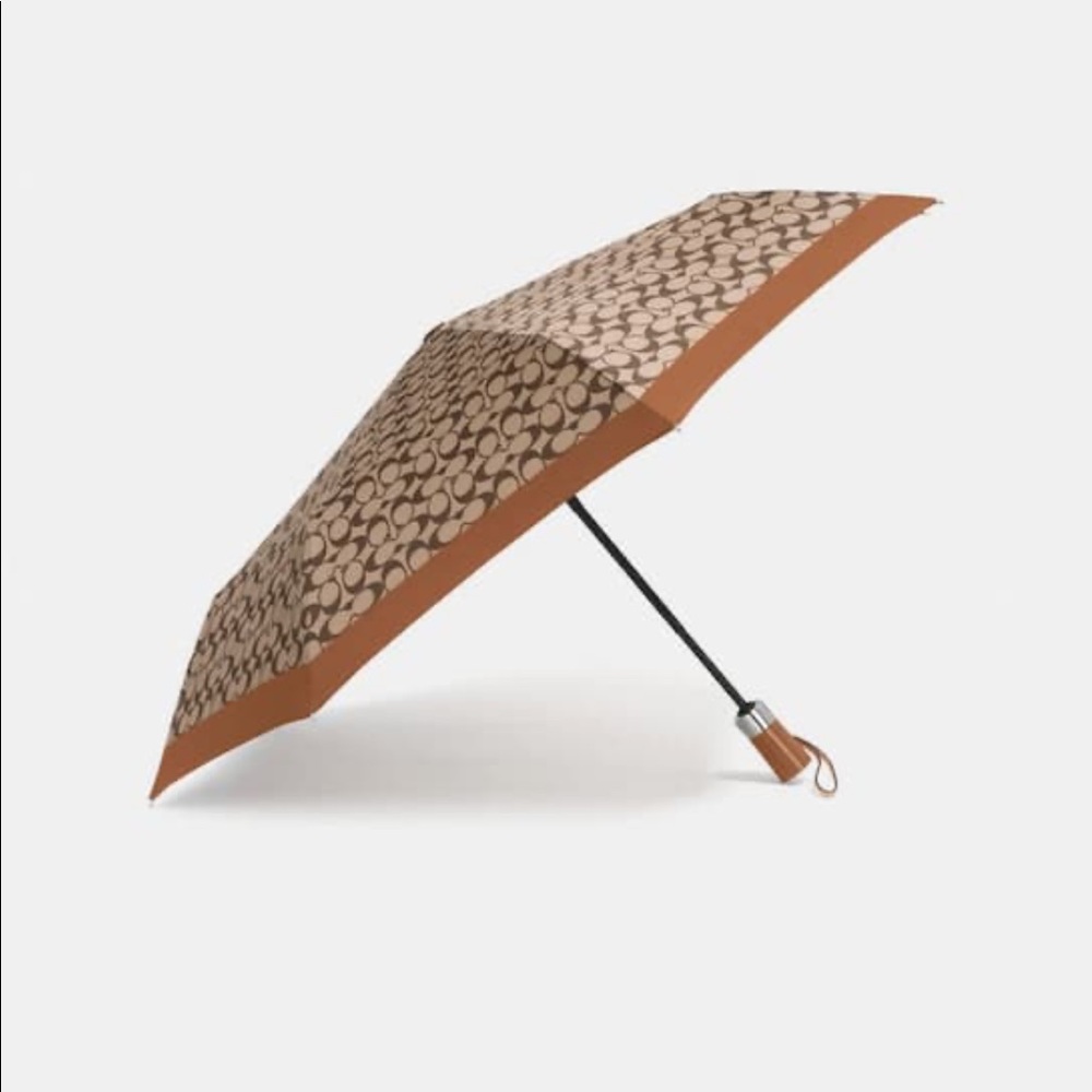 Brand new Coach umbrella